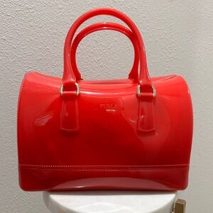 Furla “Candy” transparent jelly handbag.